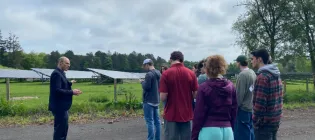 Students from Bucknell University looking at the solar farm at Easter Bush 