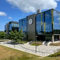 Large building with blue tinted glass 