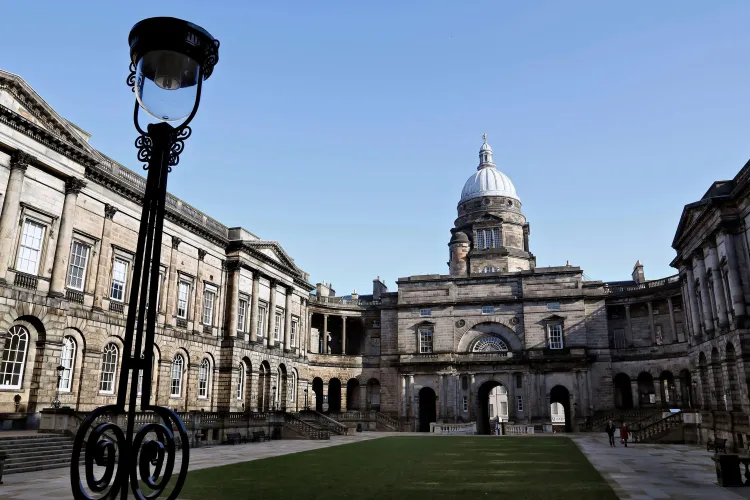 Old College building with grass quad 
