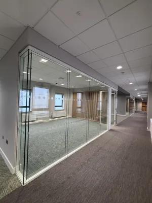 A meeting room with glass walls