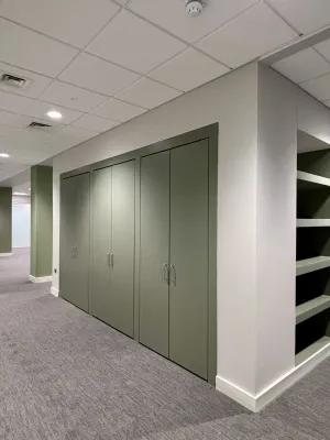A room with some cupboards and shelves